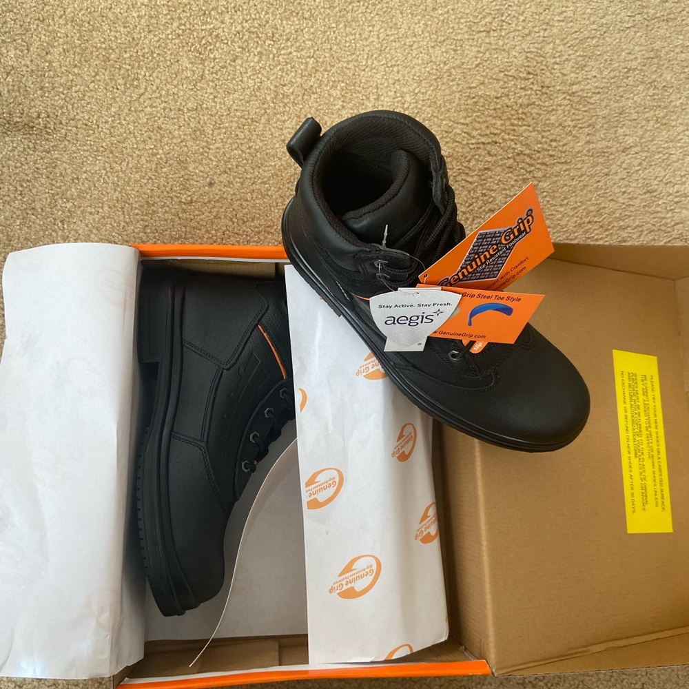 Brand new steel toe boots, 10.5 wide, slip resistant